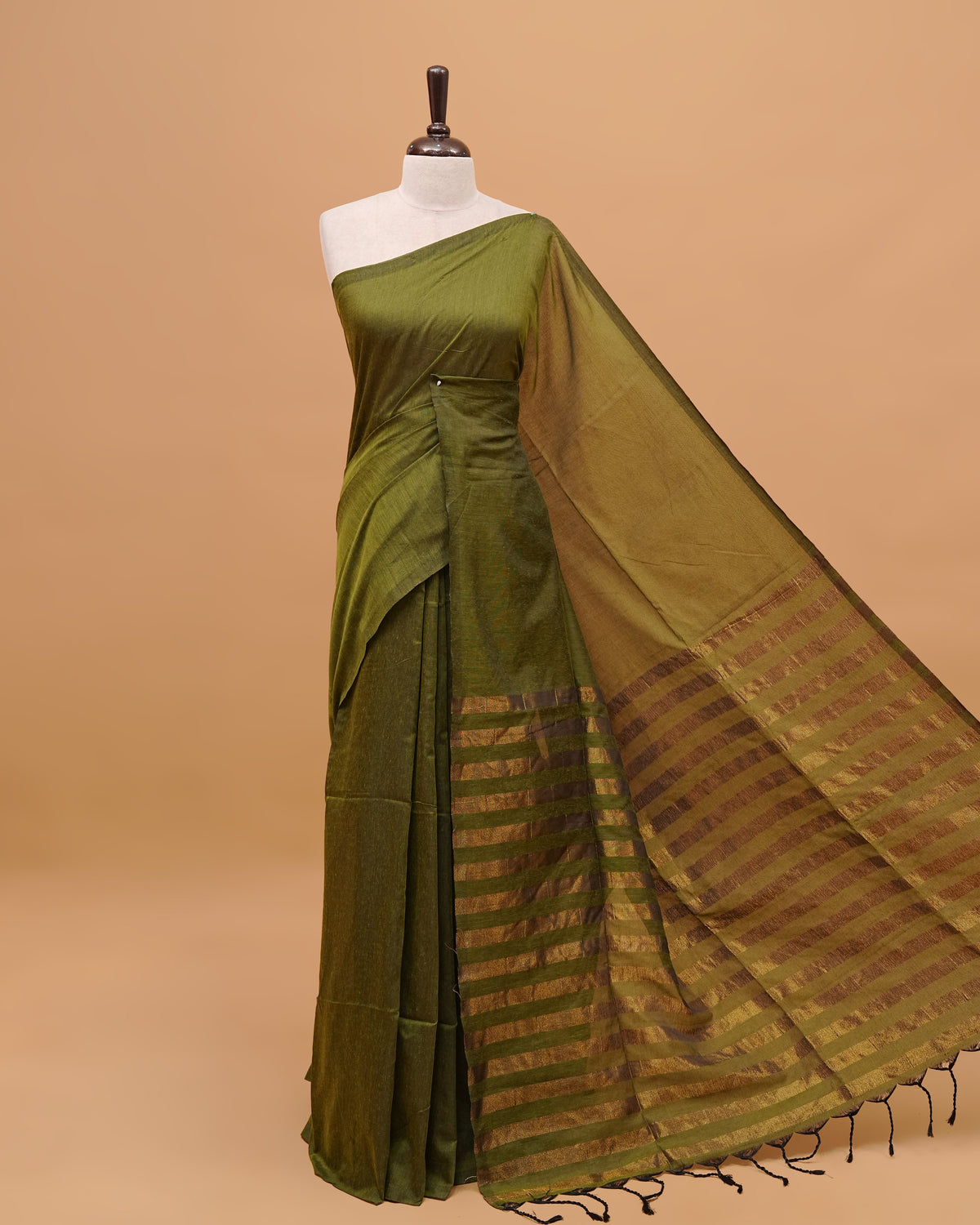 Olive Green Colour Mul Cotton Saree Featuring Plain body. With out Border Golden Strips on pallu comes With Tassels