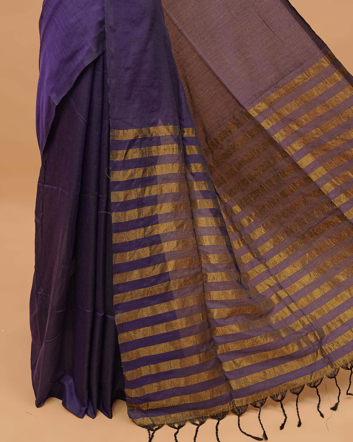 Viloet Colour Mul Cotton Saree Featuring Plain body. With out Border Golden Strips on pallu comes With Tassels