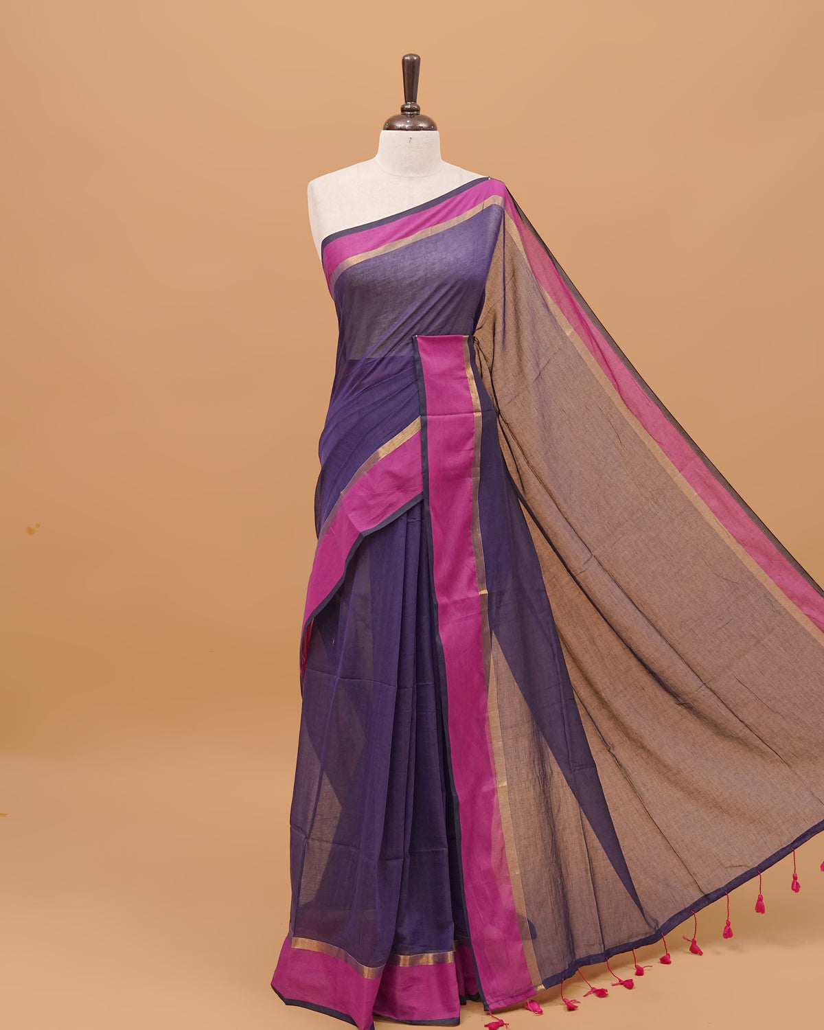 Violet Colour Mul Cotton Saree Featuring Plain body. With Contrast Gold and Purple Border, pallu comes With Blue Tassels
