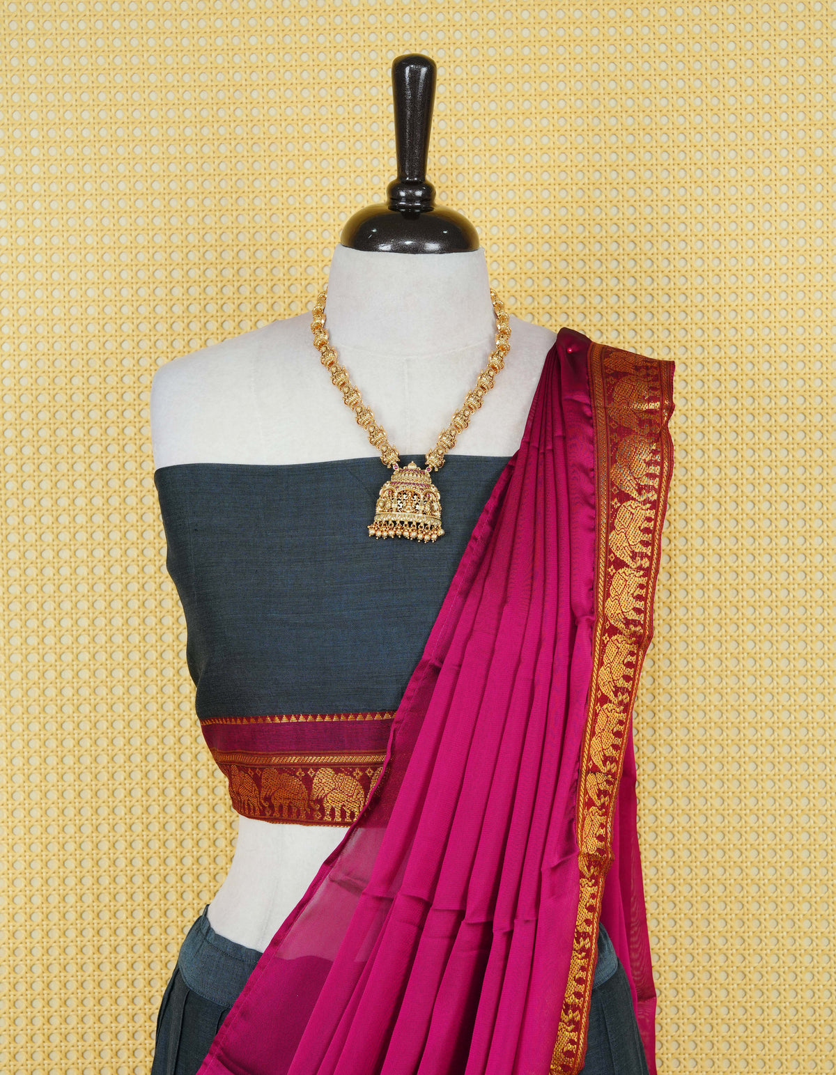 Dark Grey colour Chettinad Semi Stitched dhavani set Featuring contrast Magenta colour with Gold zari border on skirt, Contrast Blouse piece & matching dupatta.