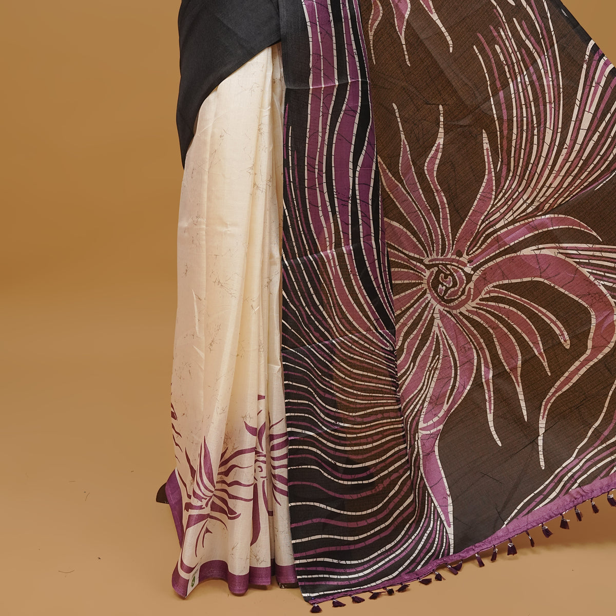 Black and off white coloured semi jute saree