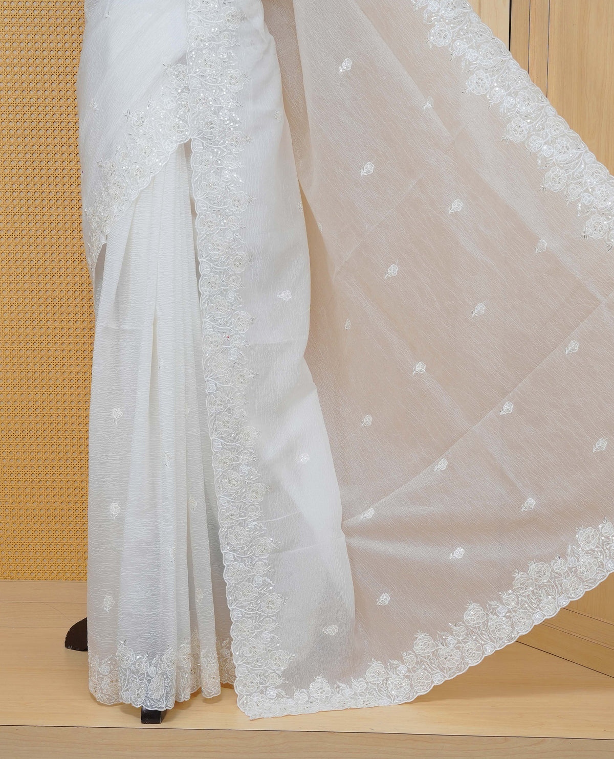 White colour Crush organza saree with Thread & Cut beat work.