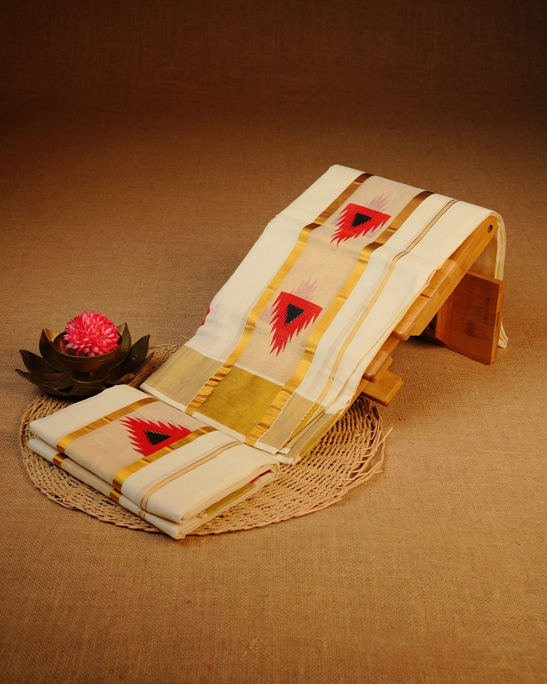 Cream colour cotton Set Mundu With Plain body, enhanced with gold Kasav With Red Temple Printed kara.