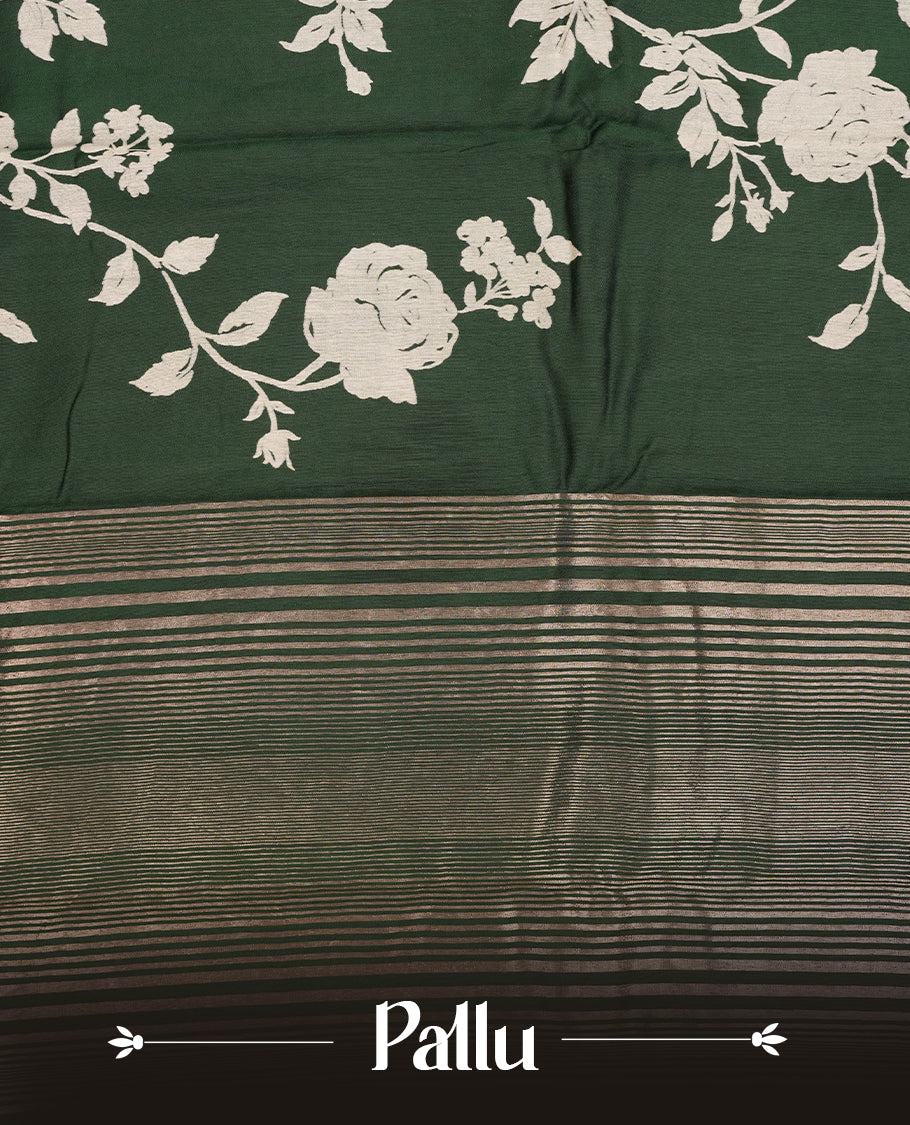 Green colour Viscos semi printed saree featuring a light golden zari border, abstract off white printed motifs on the body, and comes with a matching blouse