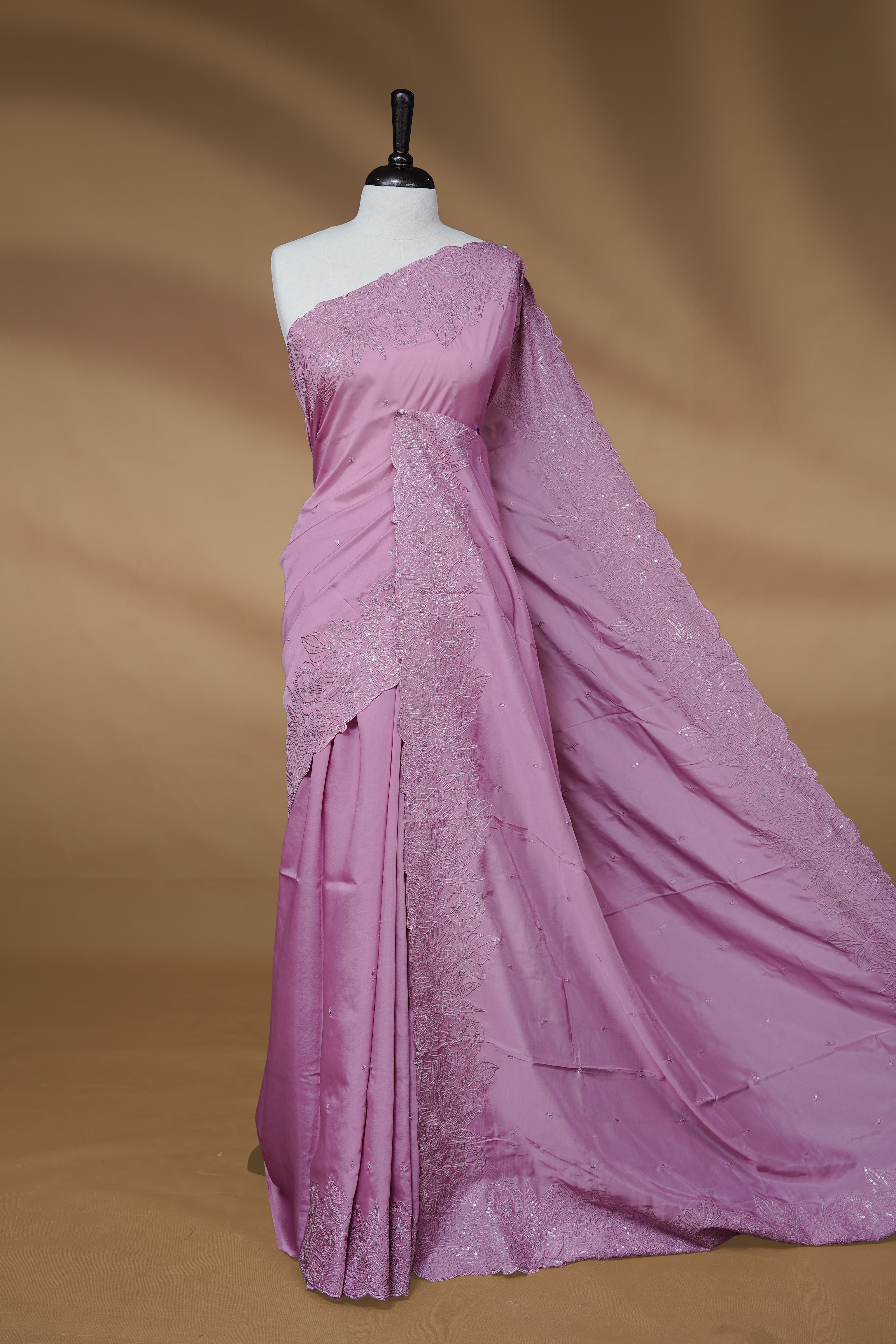 Pastel Purple colour Designer saree featuring Elegant Thread & sequins on body, complemented self colour thread & Sequins scalp border, paired with matching blouse piece.