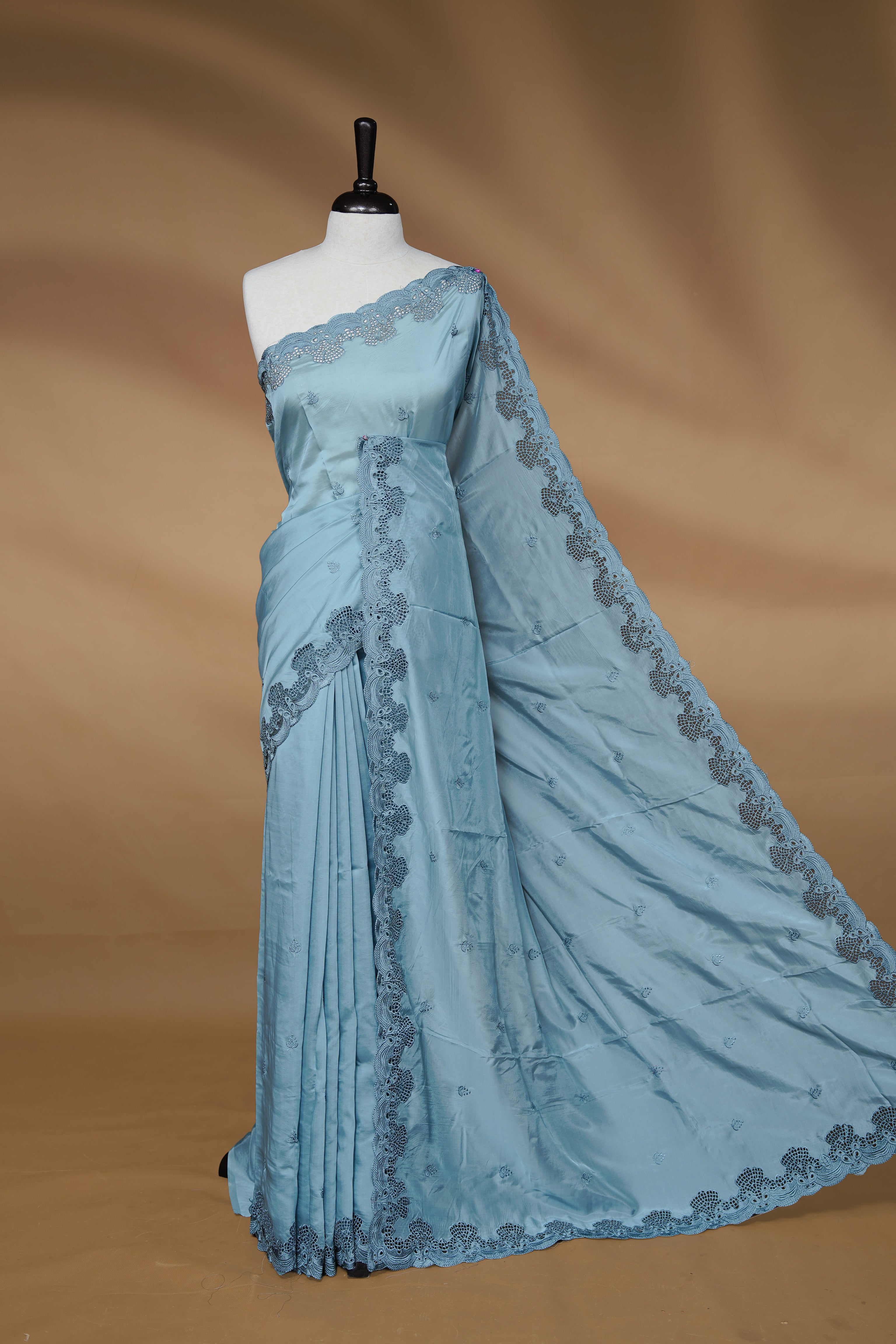 Pastel Teal colour Designer saree featuring Classic Plain body Styled with Thread motifs, Enrich with Thread & scalp border, paired with matching blouse piece.