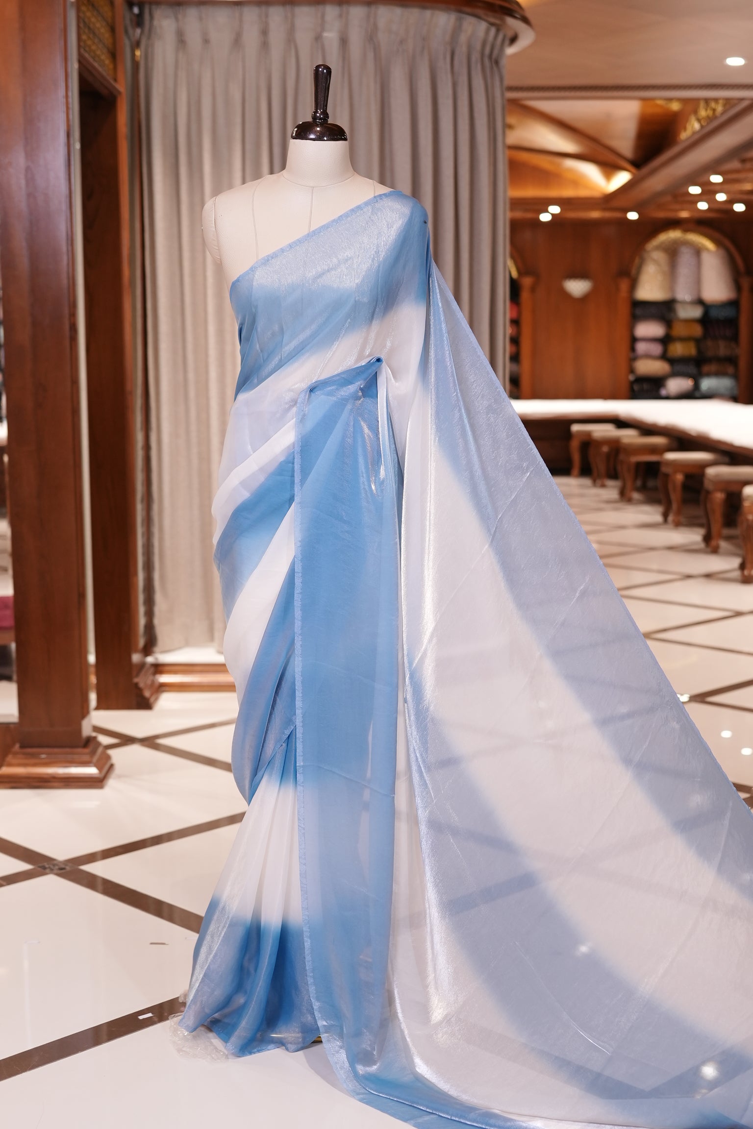 Blue Colour Soft Shine Fendy Chiffon Saree, with plain body with contrast border, without blouse.