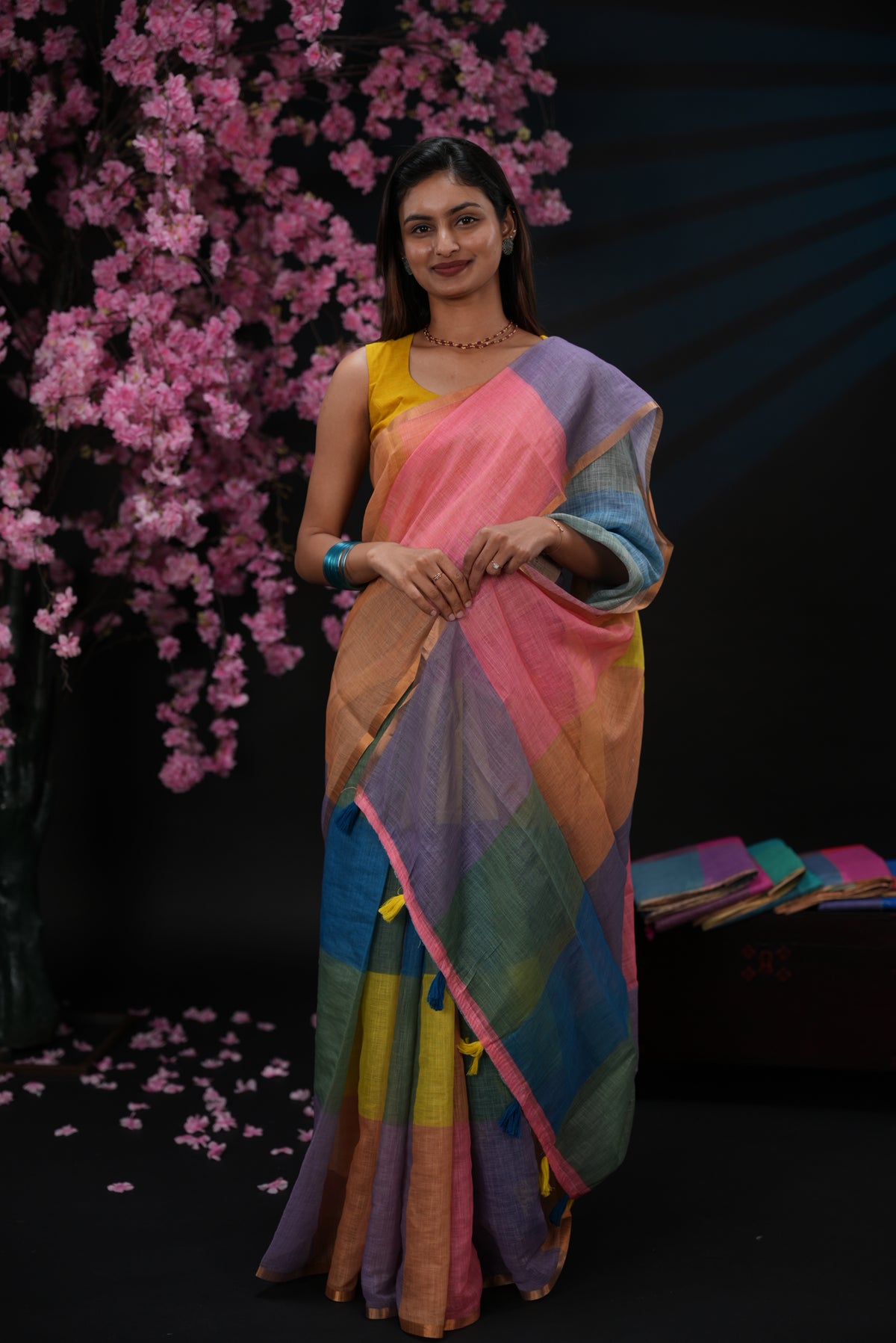 Blue & yellow colour Semi linen saree, Multi check design body, bavanchi border, contrast colour blouse.