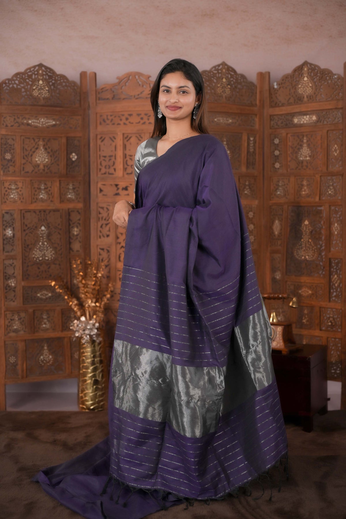 Purple Colour Soft Cotton Saree featuring a plain body, complemented by a striped pallu with tissue detailing, paired with a matching blouse piece.