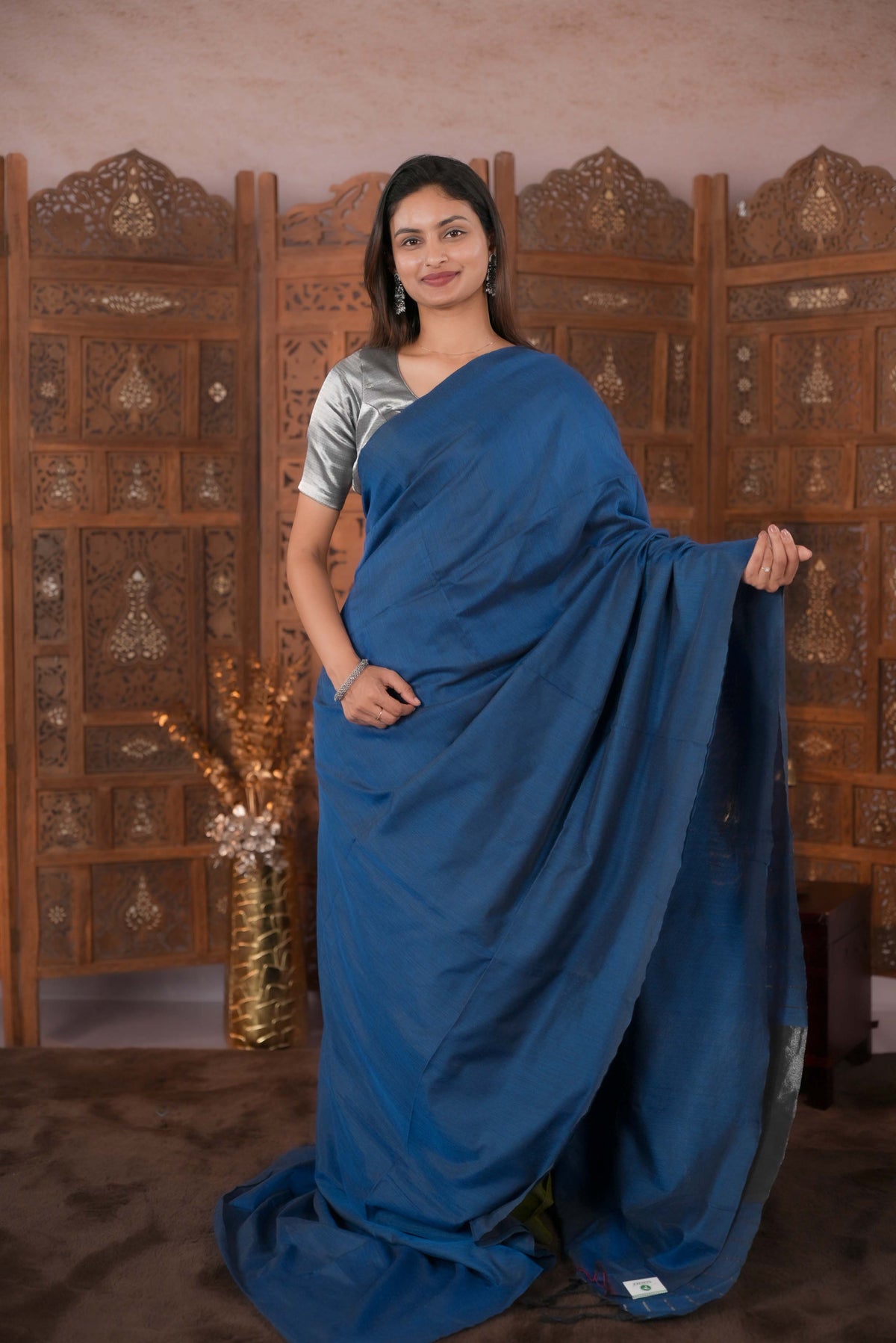 Peacock Blue Colour Soft Cotton Saree featuring a plain body, complemented by a striped pallu with tissue detailing, paired with a matching blouse piece.