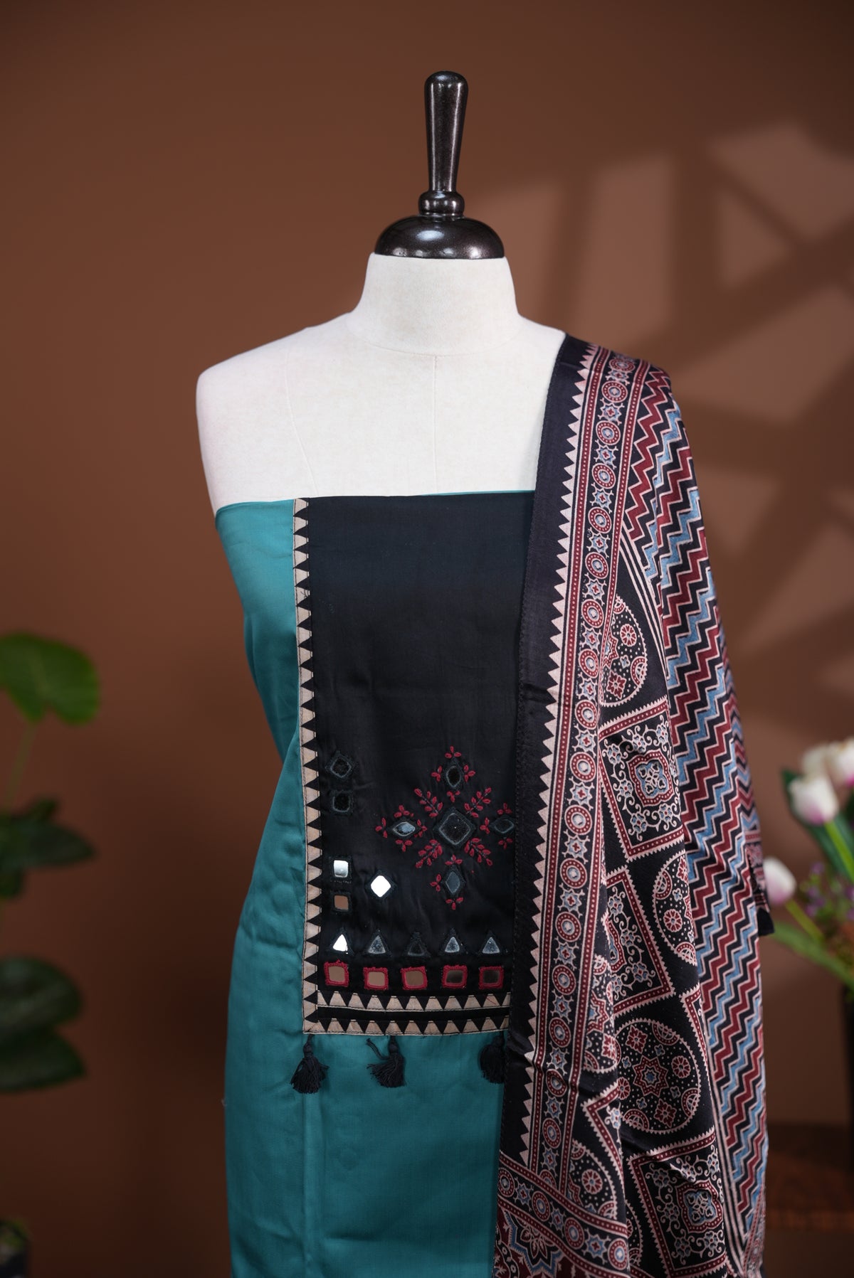 Sage Green colour Jam Satin salwar material, Plain body with mirror & thread work on neck portion, matching bottom and Dupatta with ajrak print.