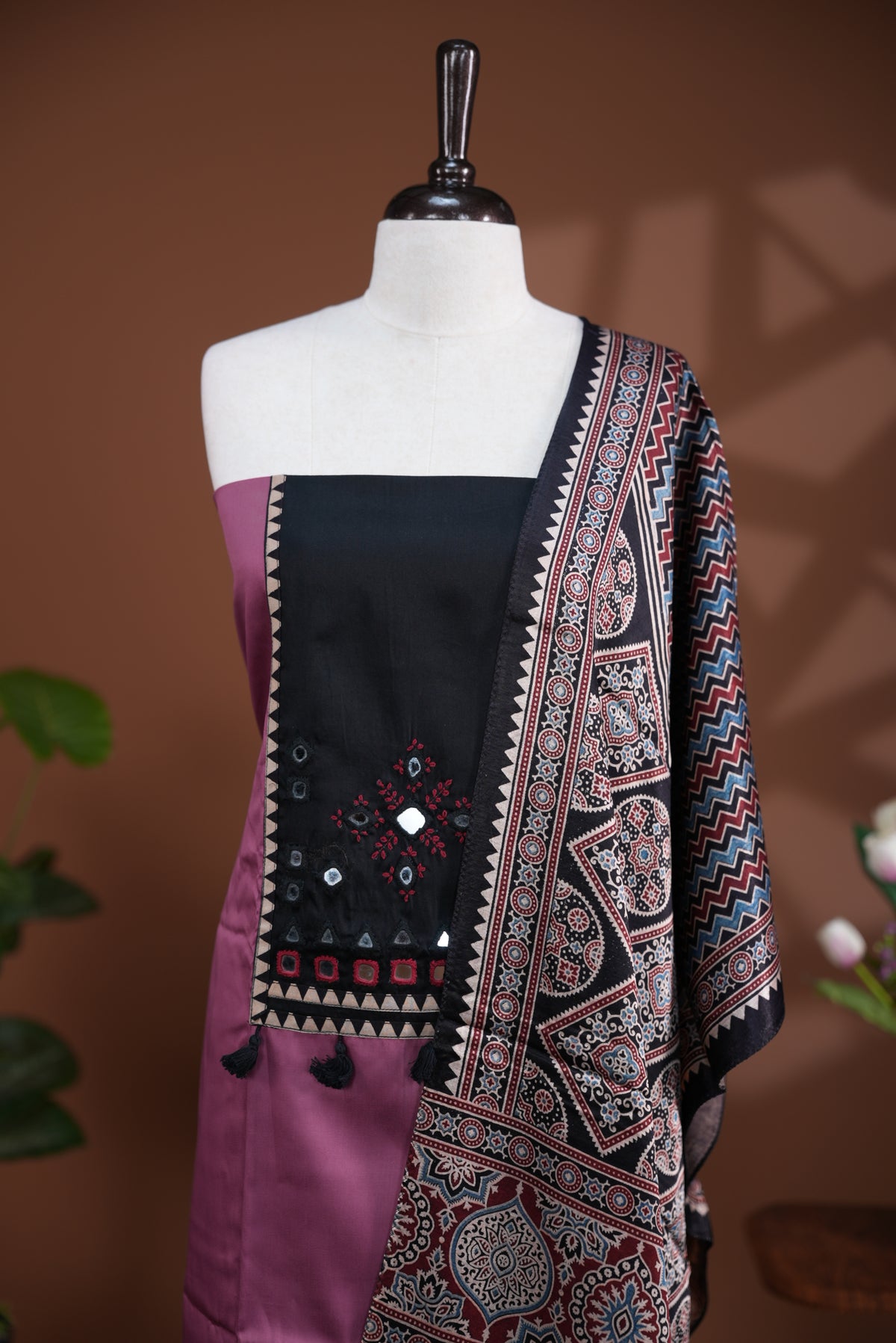 Onion Pink colour Jam Satin salwar material, Plain body with mirror & thread work on neck portion, matching bottom and Dupatta with ajrak print.