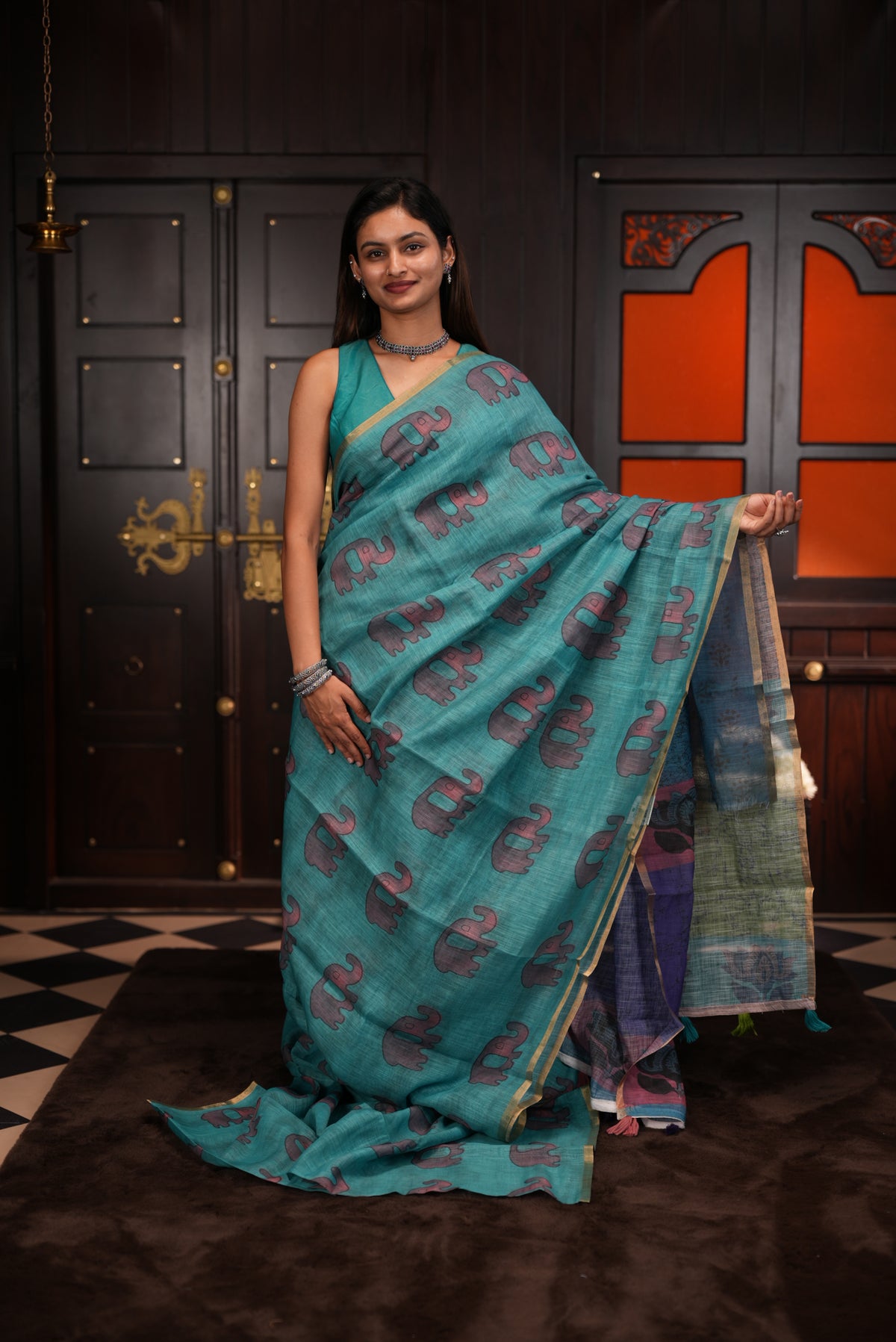 Teal Green colour Semi linen saree, Elephant print body, bavanchi border, contrast colour blouse.