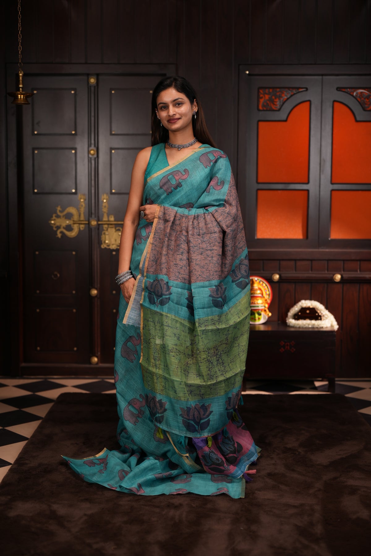 Teal Green colour Semi linen saree, Elephant print body, bavanchi border, contrast colour blouse.