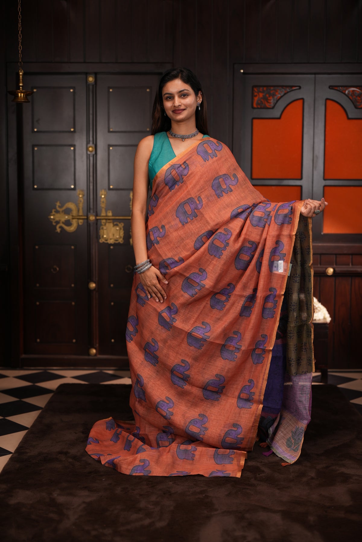 Rust Orange colour Semi linen saree, Elephant print body, bavanchi border, contrast colour blouse.