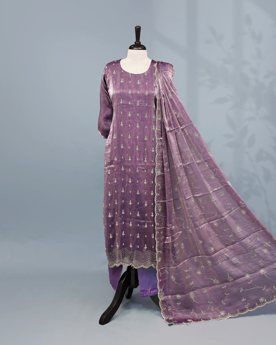 Lavender colour salwar set with Stone work on top, paired with matching bottom & Dupatta.