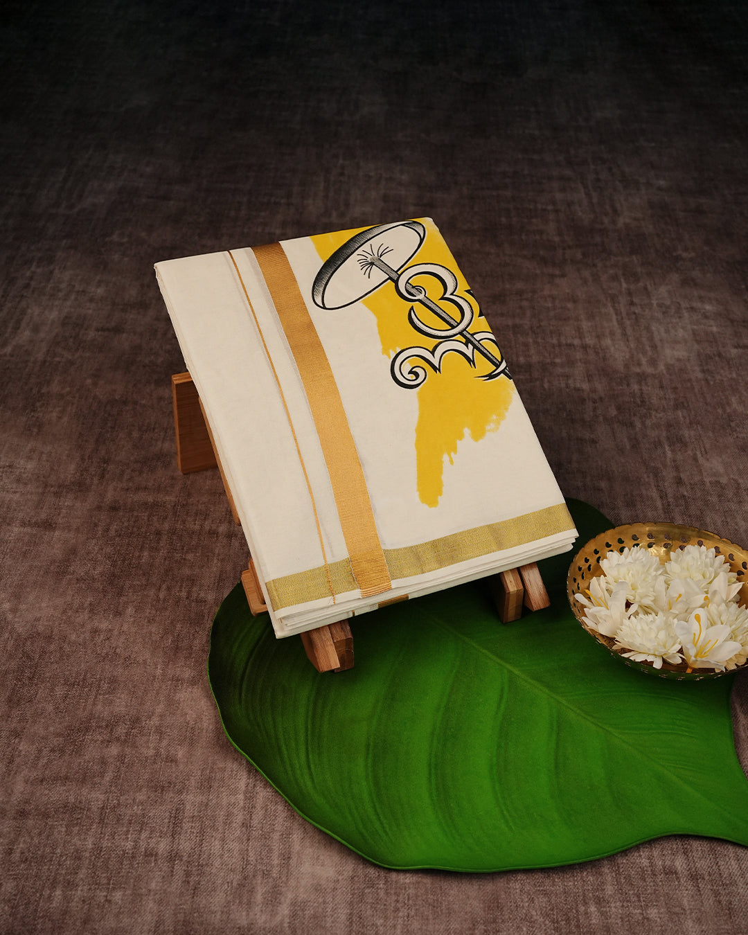 Cream Coloured Cotton Double Dhoti Finished with Onam Themed Prints & Gold Kara