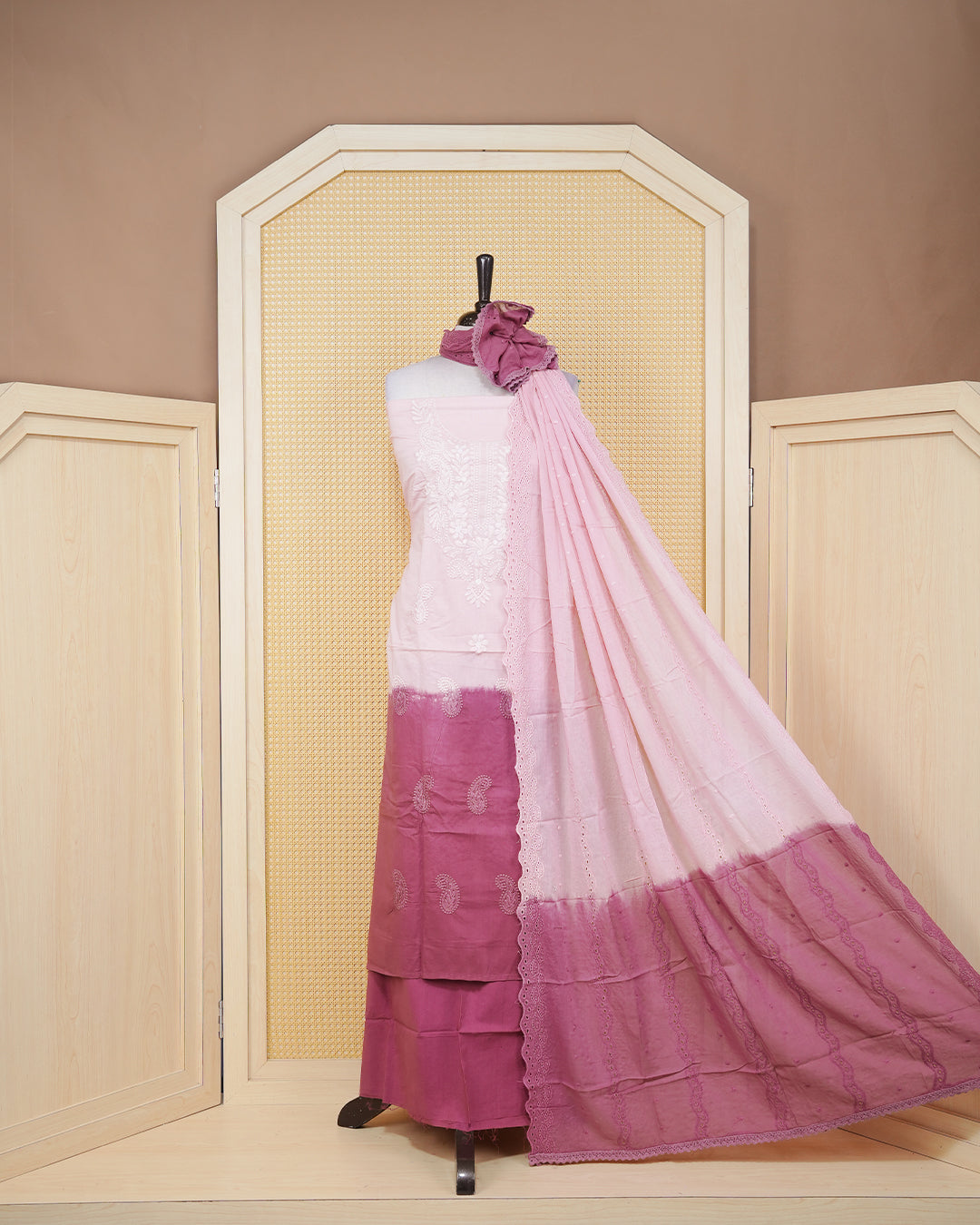 Baby Pink & Dark mauve colour half an half Cotton Salwar material featuring an elegant Floral Chikankari Work on the body, paired with a matching bottom and an elegant dupatta.