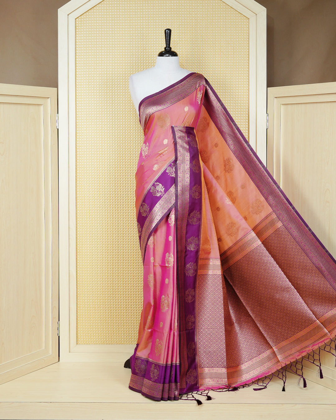 Peach & gold double shade Mulberry silk saree featuring gold floral zari patterns on body , paired with contrast purple colour with traditional border, comes with matching blouse piece.