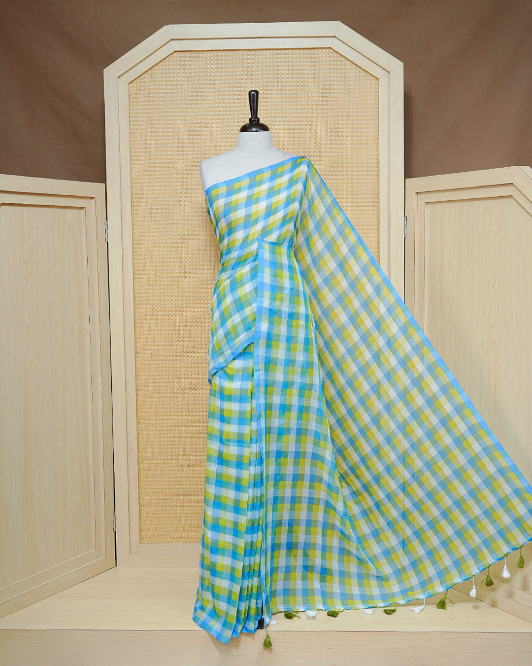 Green, Blue & white Mul cotton saree featuring Small Check pattern across body, complemented by Elegant Tassels.