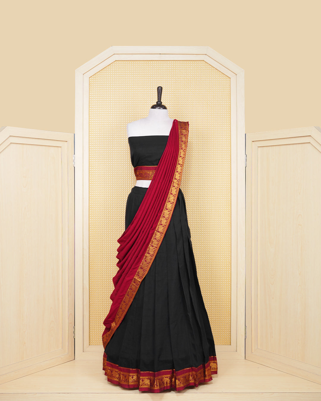 Black colour Chettinad Semi Stitched dhavani set Featuring maroon with light Gold zari work on skirt, matching Blouse & Contrast dupatta.