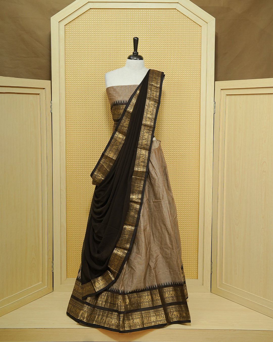 Grey colour Chettinad Semi Stitched dhavani set Featuring contrast Dark chocolate with Gold zari border on skirt, Contrast Blouse & matching dupatta.