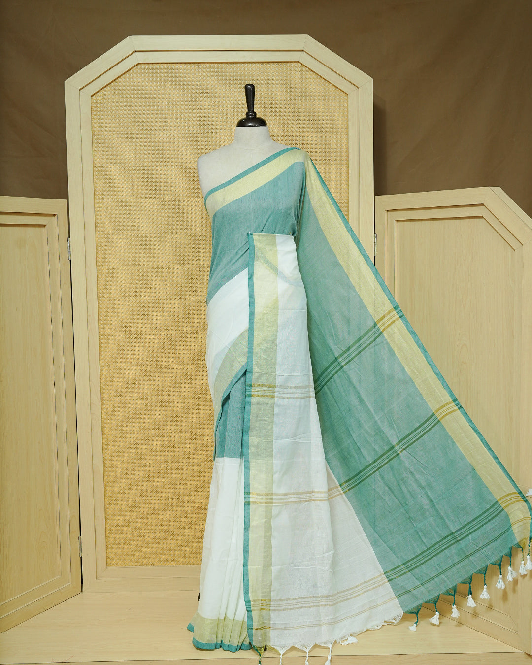 Sea Green & White Colour Half & Half Mul cotton saree Complemented by contrast colour Gold Zari Border & tassels.