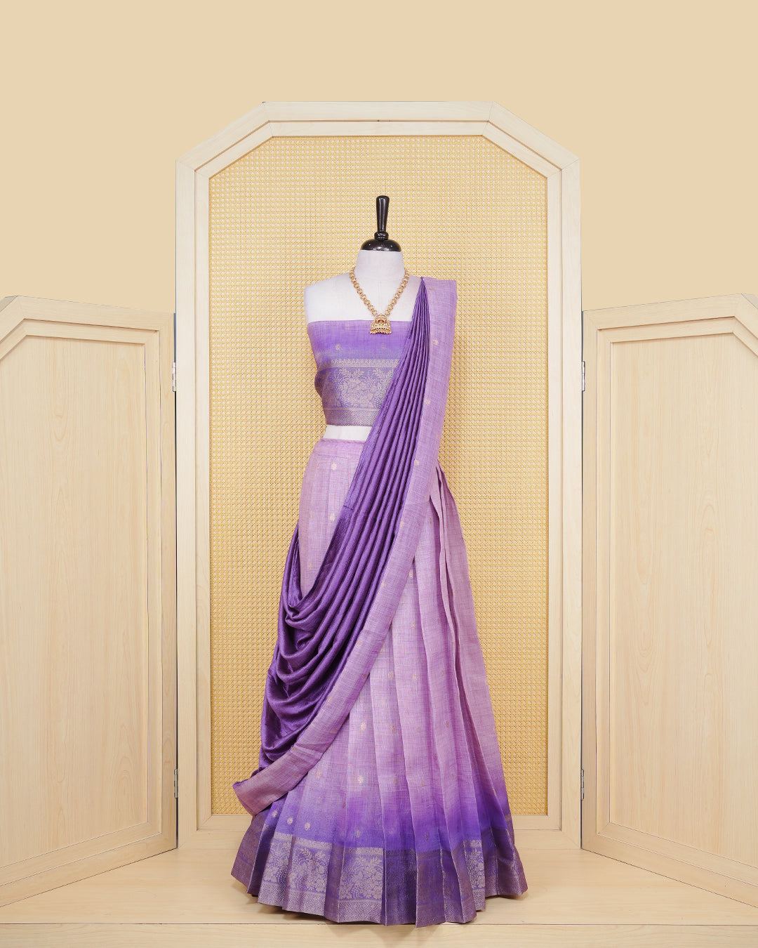 Lilac & royal purple colour Linen Silk Semi stitched dhavani set featuring buttas, zari bordered skirt & blouse piece and dupatta.