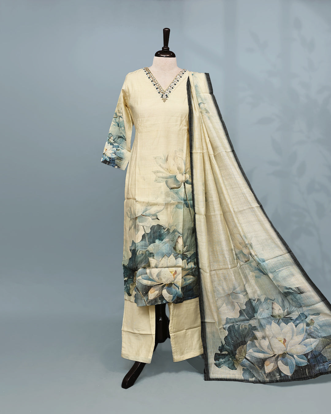 Cream colour Salwar set comes top with beats Work on neck line and Digital print on body, paired with matching bottom and dupatta.
