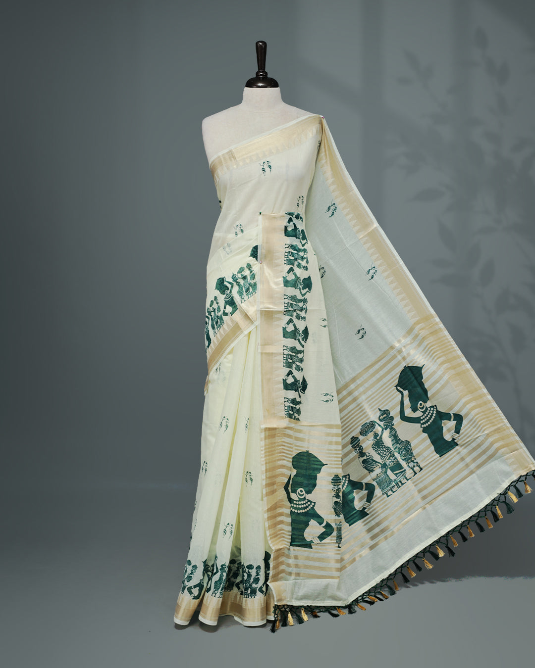Cream colour Semi chanderi kerala saree featuring Green colour Print on body, complemented by Light Gold zari Border, paired with matching blouse piece.