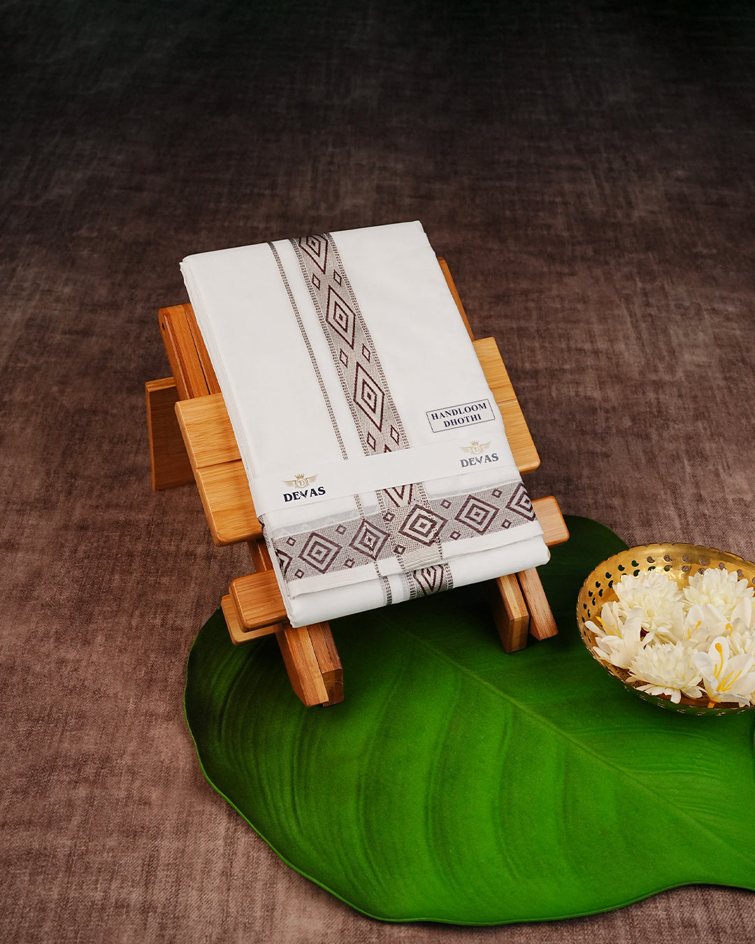 Off White Colour Handloom Cotton Double Dhoti Finished With A Maroon Designed Pattern On Rose Gold kara.