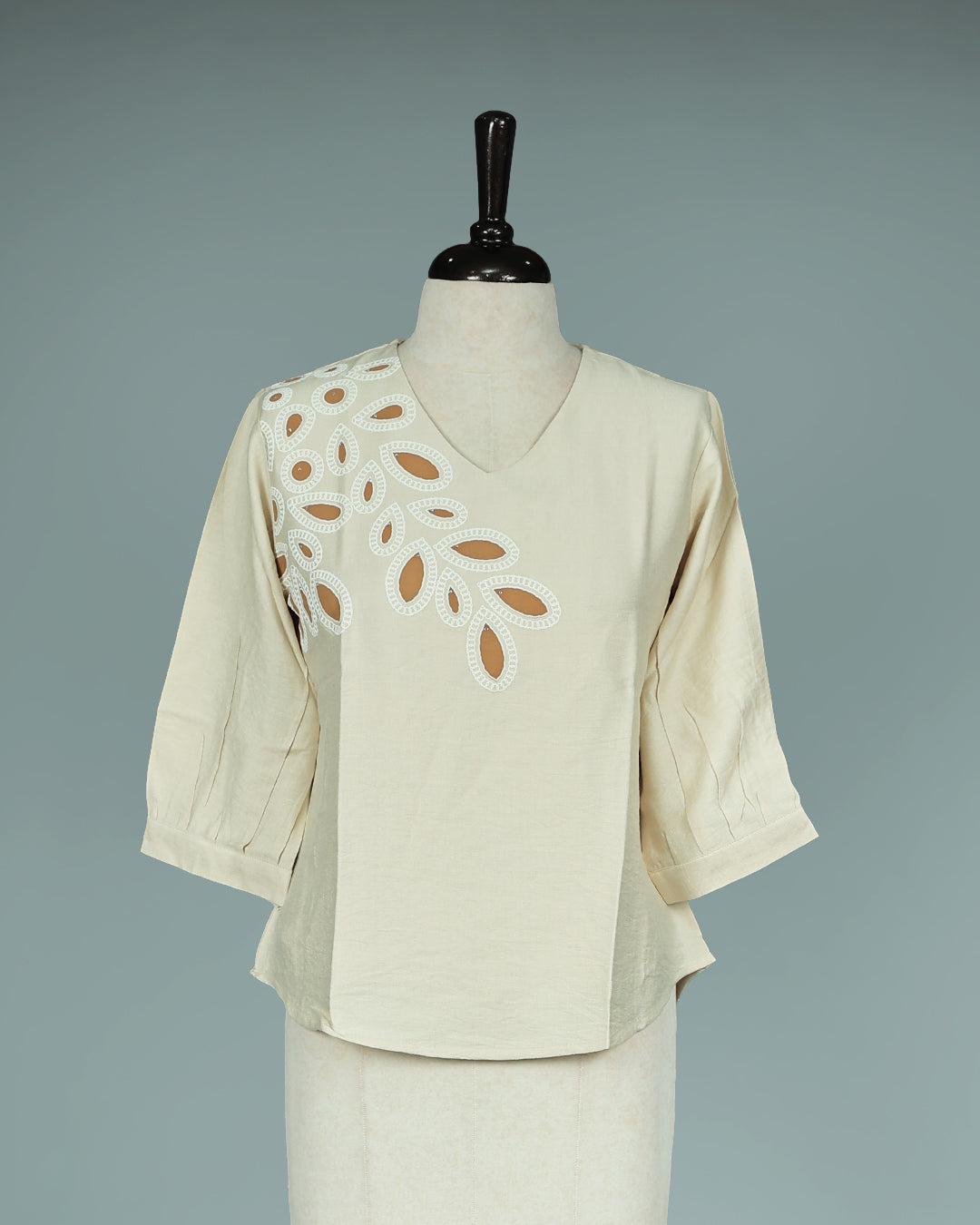 Cream colour Top with Thread work on body, V Neck design, With sleeve.