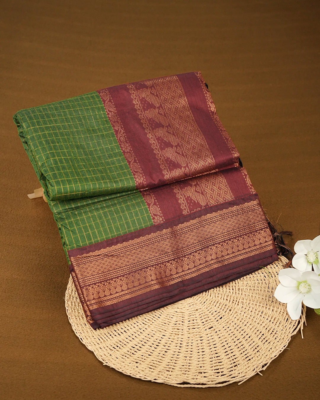Light Green colour kalyani cotton saree featuring gold zari check pattern on body, complemented by Maroon colour with Antique zari border, paired with matching blouse piece