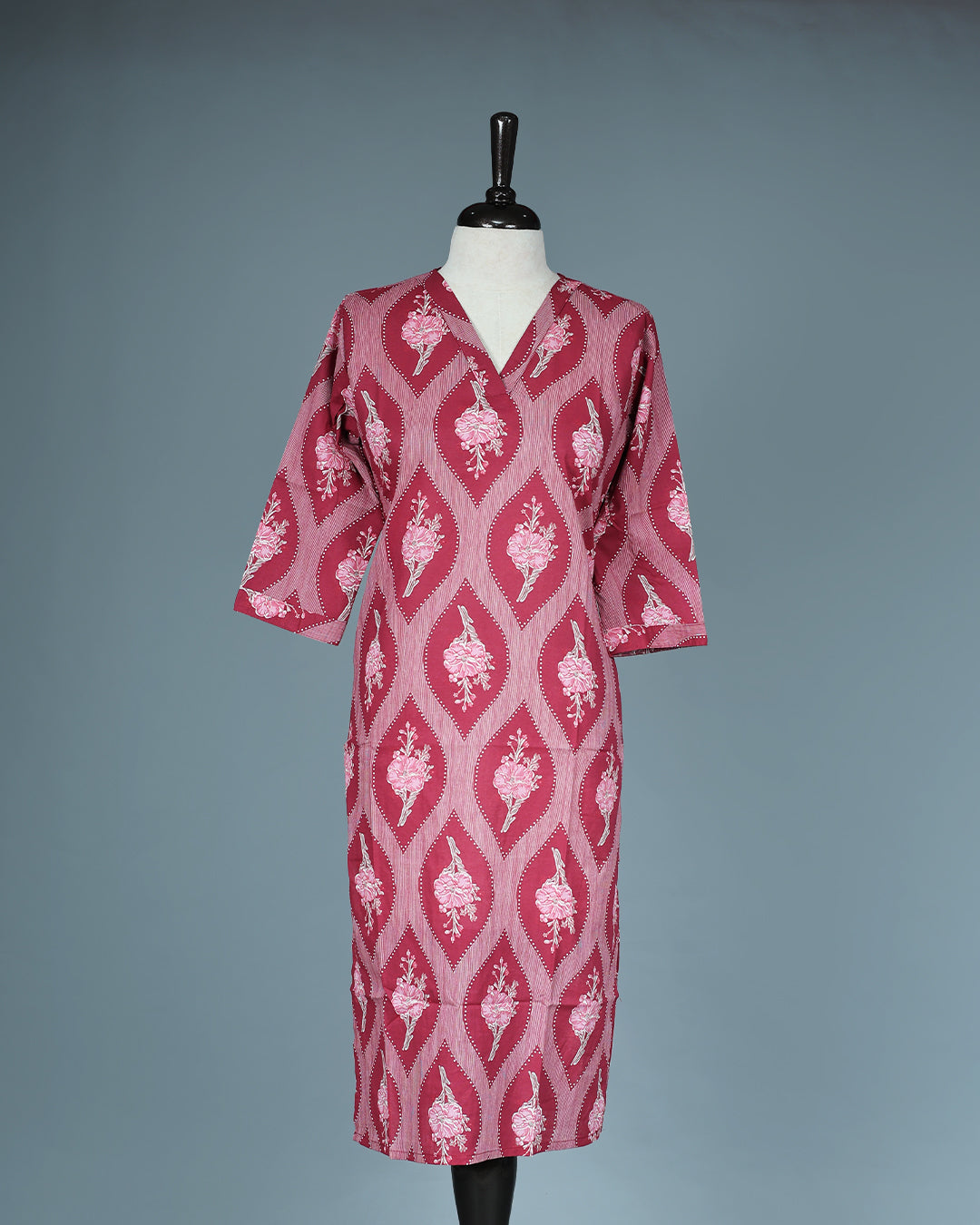 Maroon Colour Kurti featuring print Work On body , a V neckline, With sleeve.