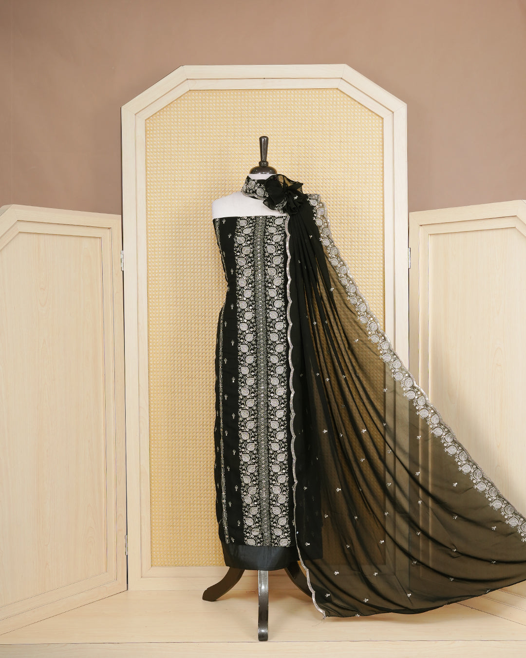 Black colour Georgette Salwar Material Featuring Gold Thread Work on body, paired with matching Bottom & Elegant Dupatta.