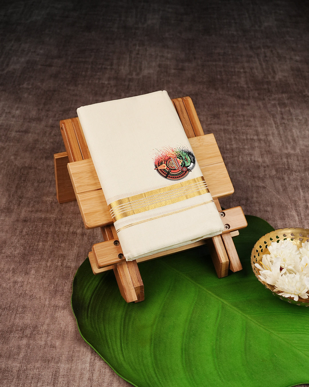 Cream Coloured Cotton Double Dhoti Finished with Kathakali Prints & Gold Kara