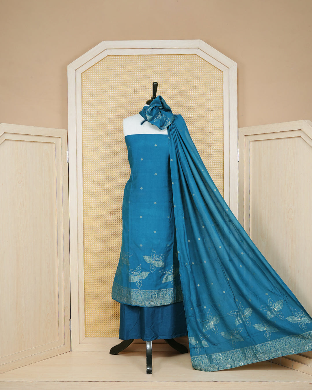 Teal Blue colour Banares Salwar material Featuring Gold zari floral motifs on body, paired with matching bottom & Elegant Dupatta