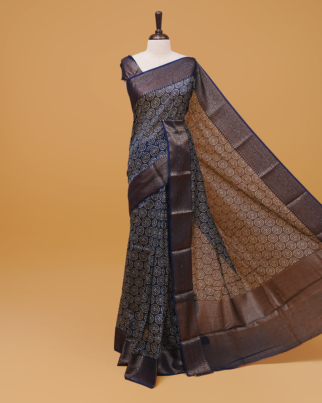 Navy Blue Colour Chanderi Silk Saree featuring dotted round motifs across the body, traditional antique zari border and paired with a matching blouse piece.
