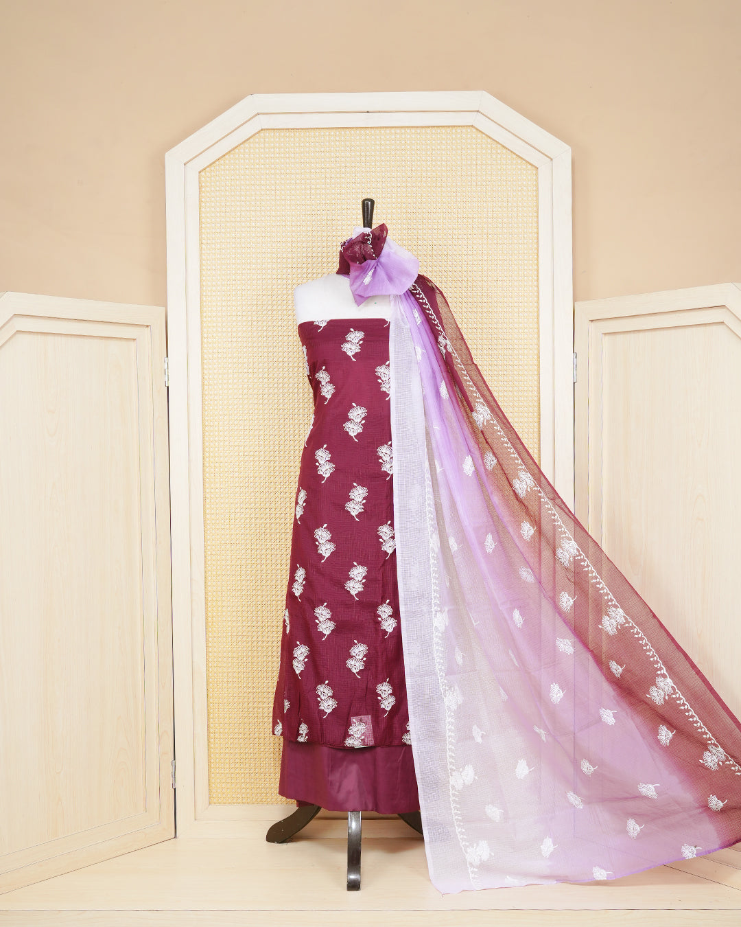 Maroon and lavender colour net kota salwar material Featuring Floral thread motifs on body, paired with matching bottom & Elegant Dupatta