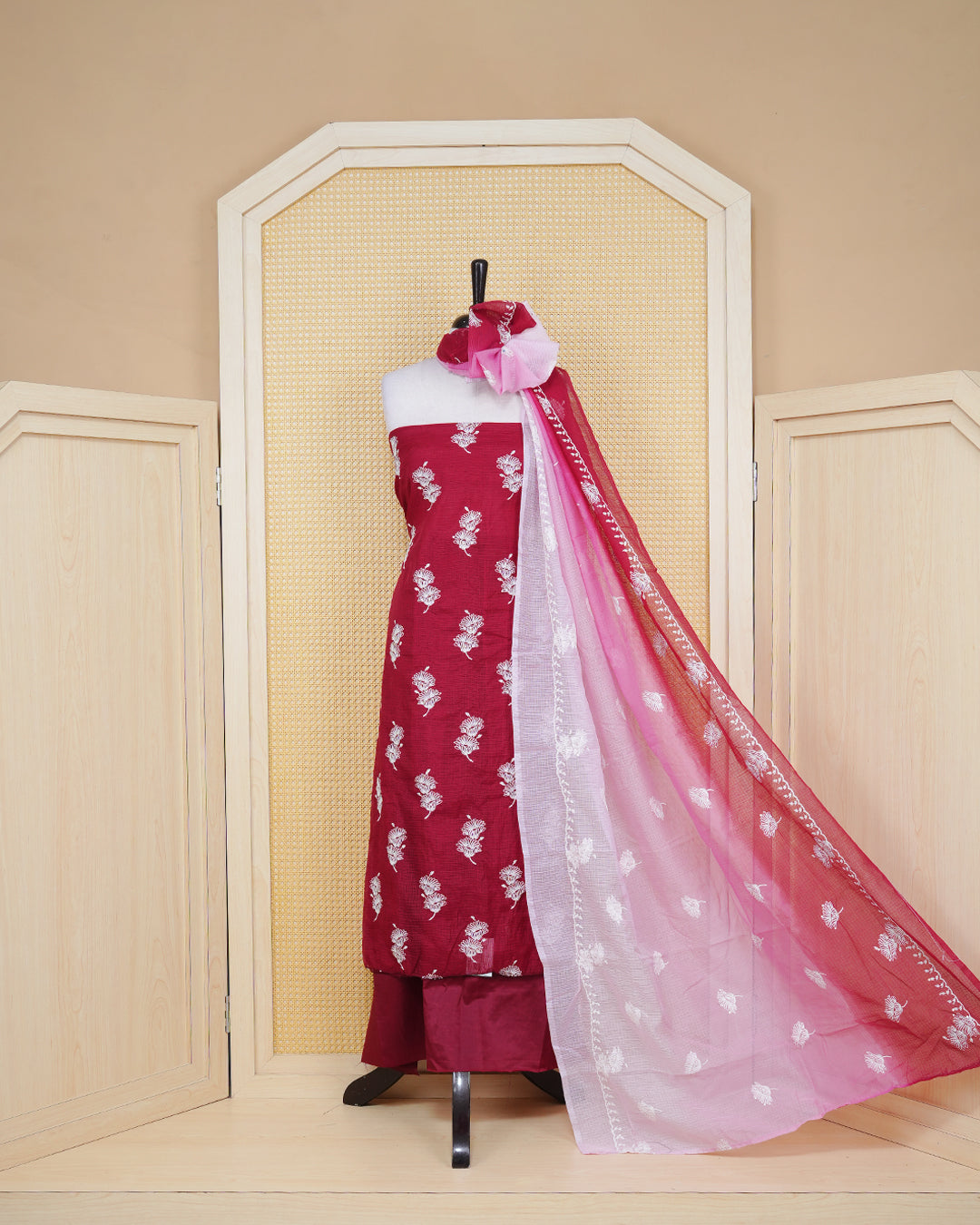 Maroon and pink colour net kota salwar material Featuring Floral thread motifs on body, paired with matching bottom & Elegant Dupatta