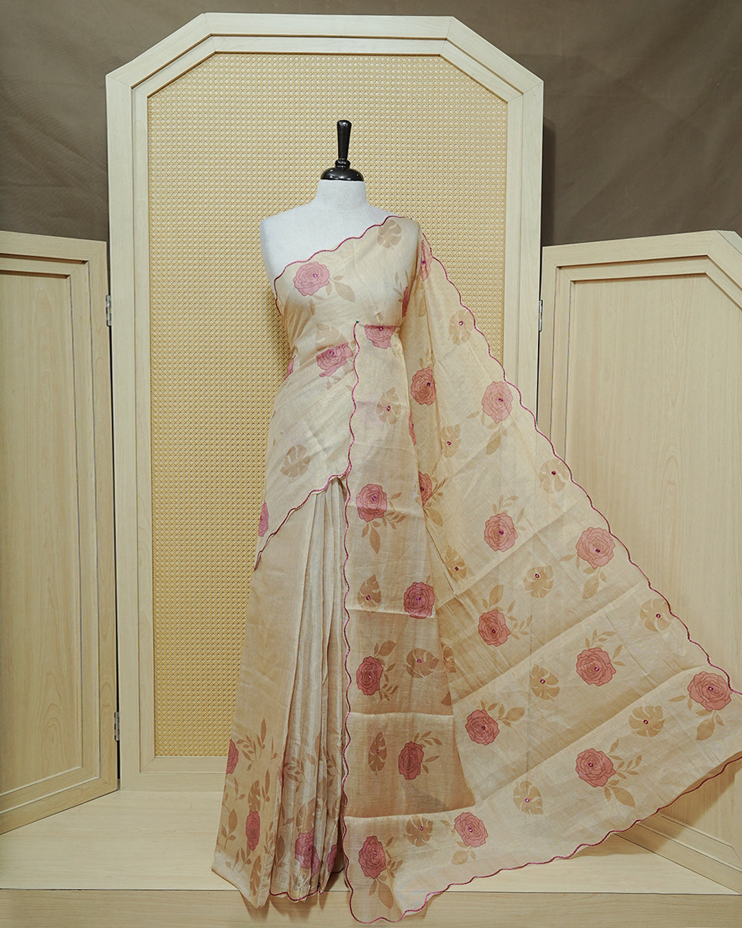 Pink colour Semi tissue saree featuring elegant Rose print with delicate Mirror Work, beautiful Scallop border.