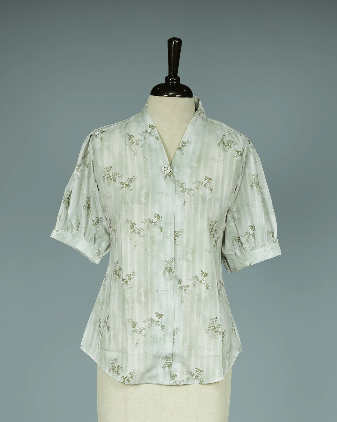 Light Green colour Top with Leaf Print work on body, collar design, With sleeve.