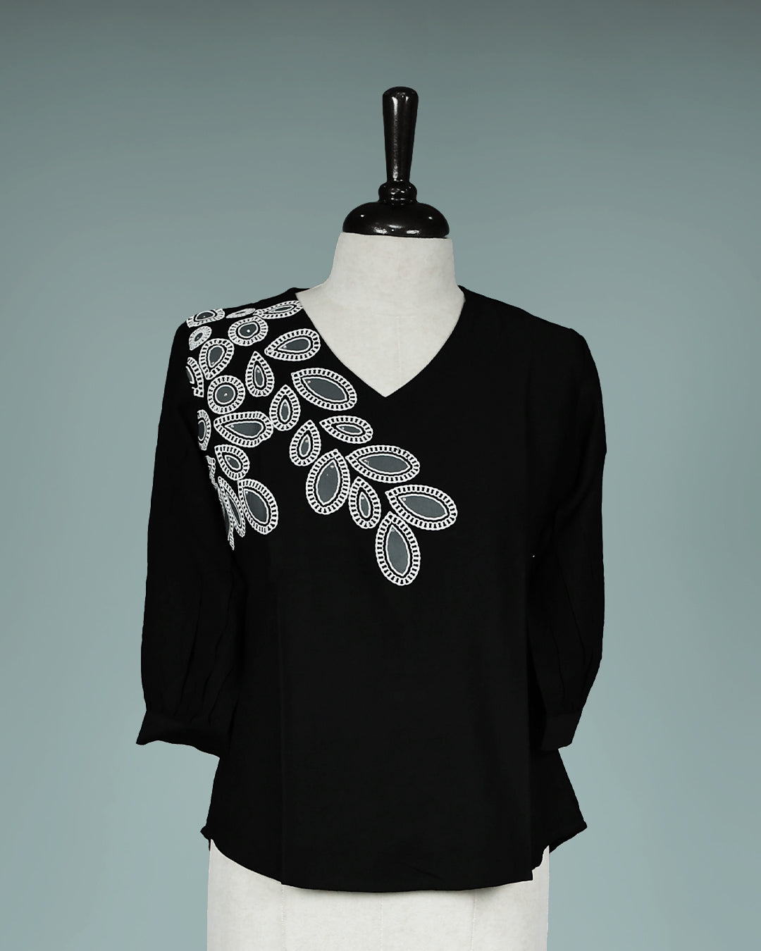 Black colour Top with Thread work on body, V Neck design, With sleeve.