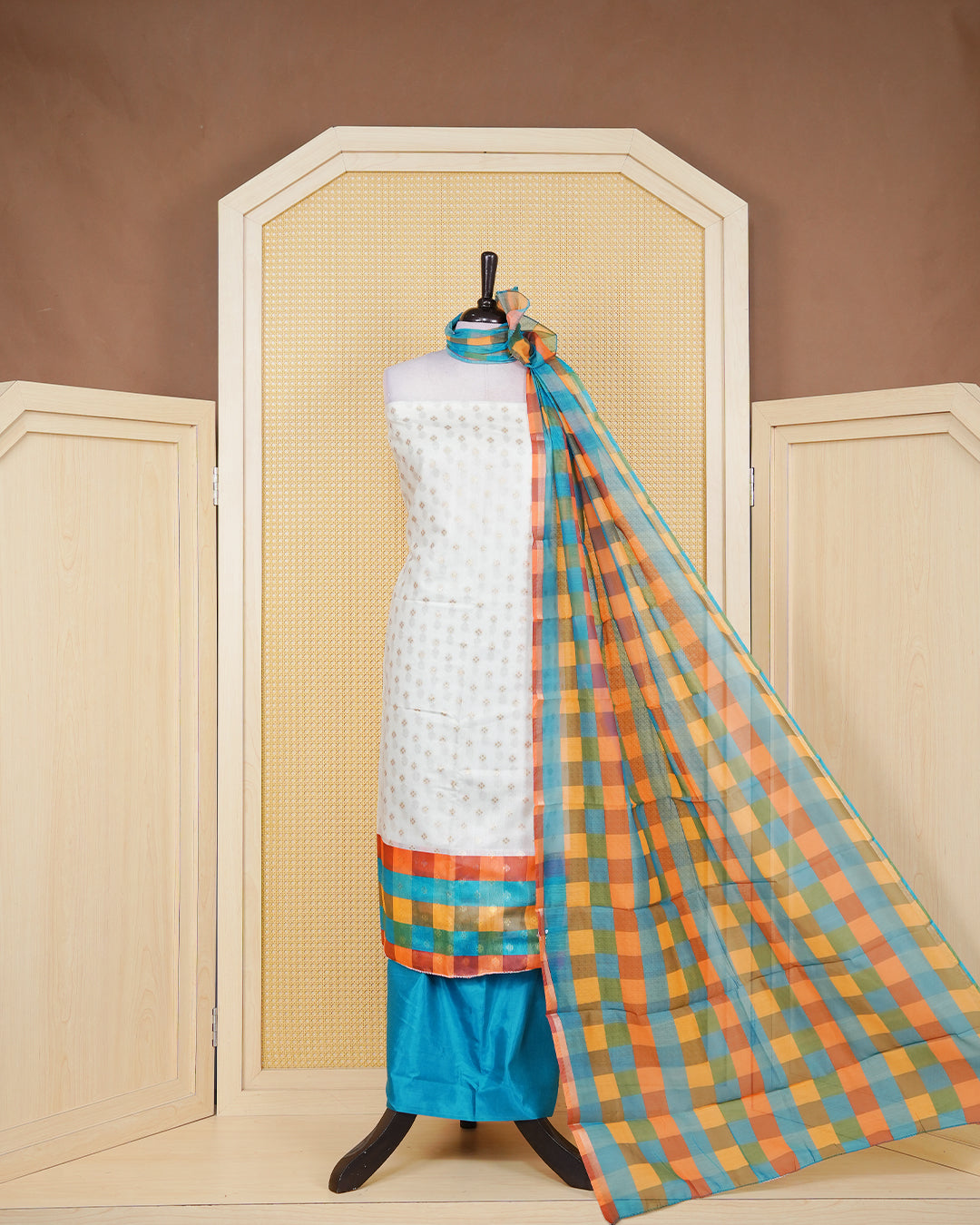 White & Teal Chanderi salwar material featuring Gold zari Small motifs on body and Check pattern body, paired with matching colour santoon bottom, elegant dupatta.