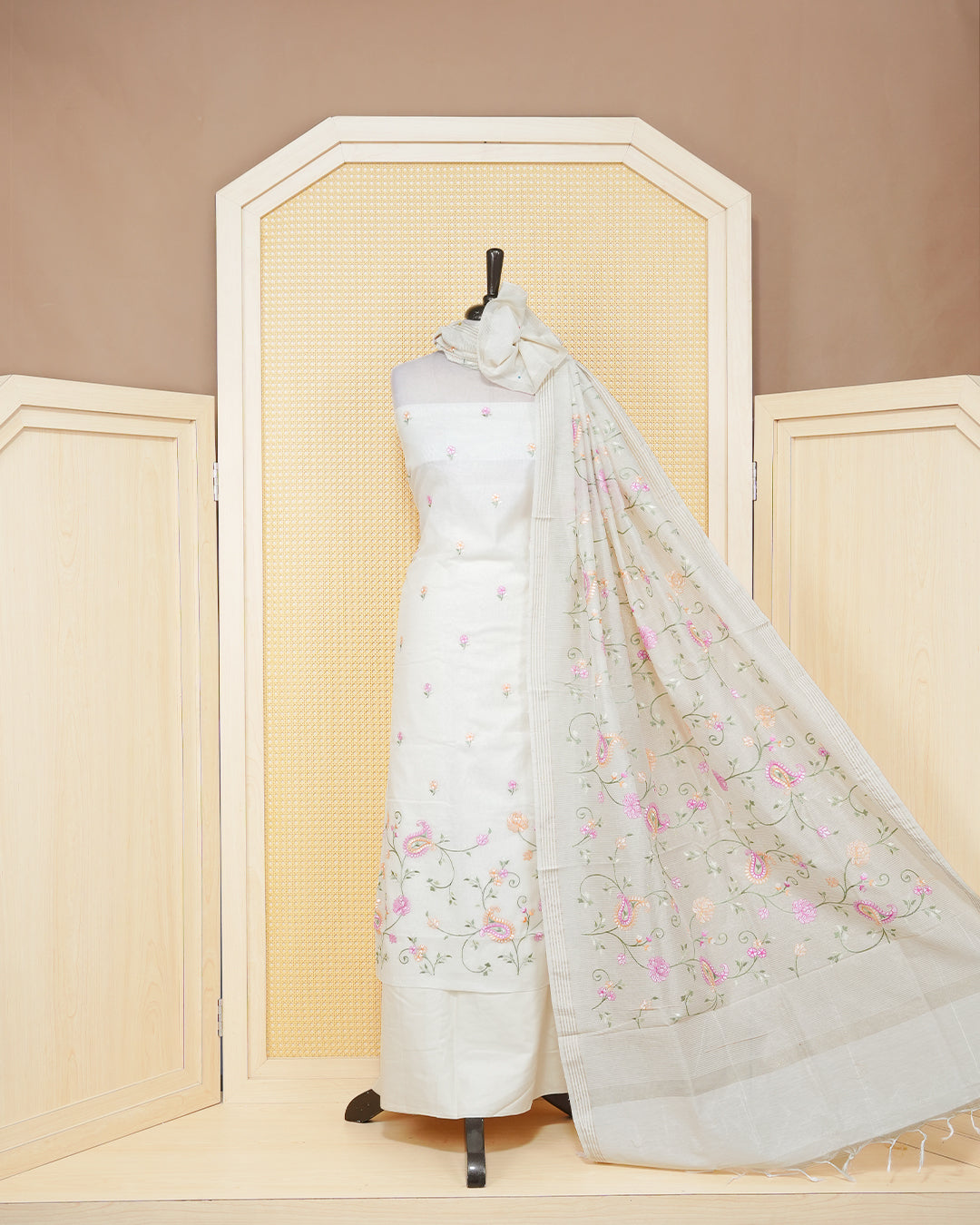 Cream colour tissue salwar material featuring an elegant floral Thread Work on Body , paired with a matching bottom and an elegant dupatta.