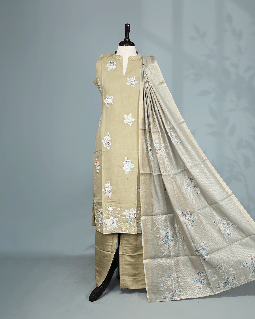 Pastel Olive colour Salwar set comes top with floral pattern on body, paired with matching bottom and dupatta.