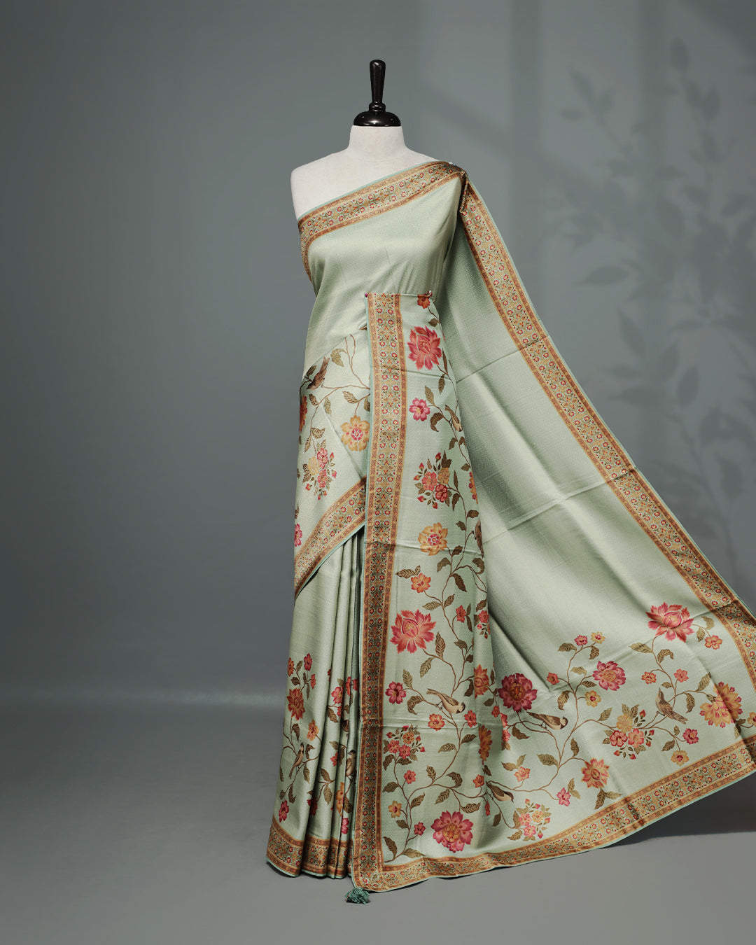 Mint Colour Pashmina Saree featuring a Patterned body, complemented by Self colour with Floral pattern & gold zari on border and Pallu, comes with matching blouse piece.