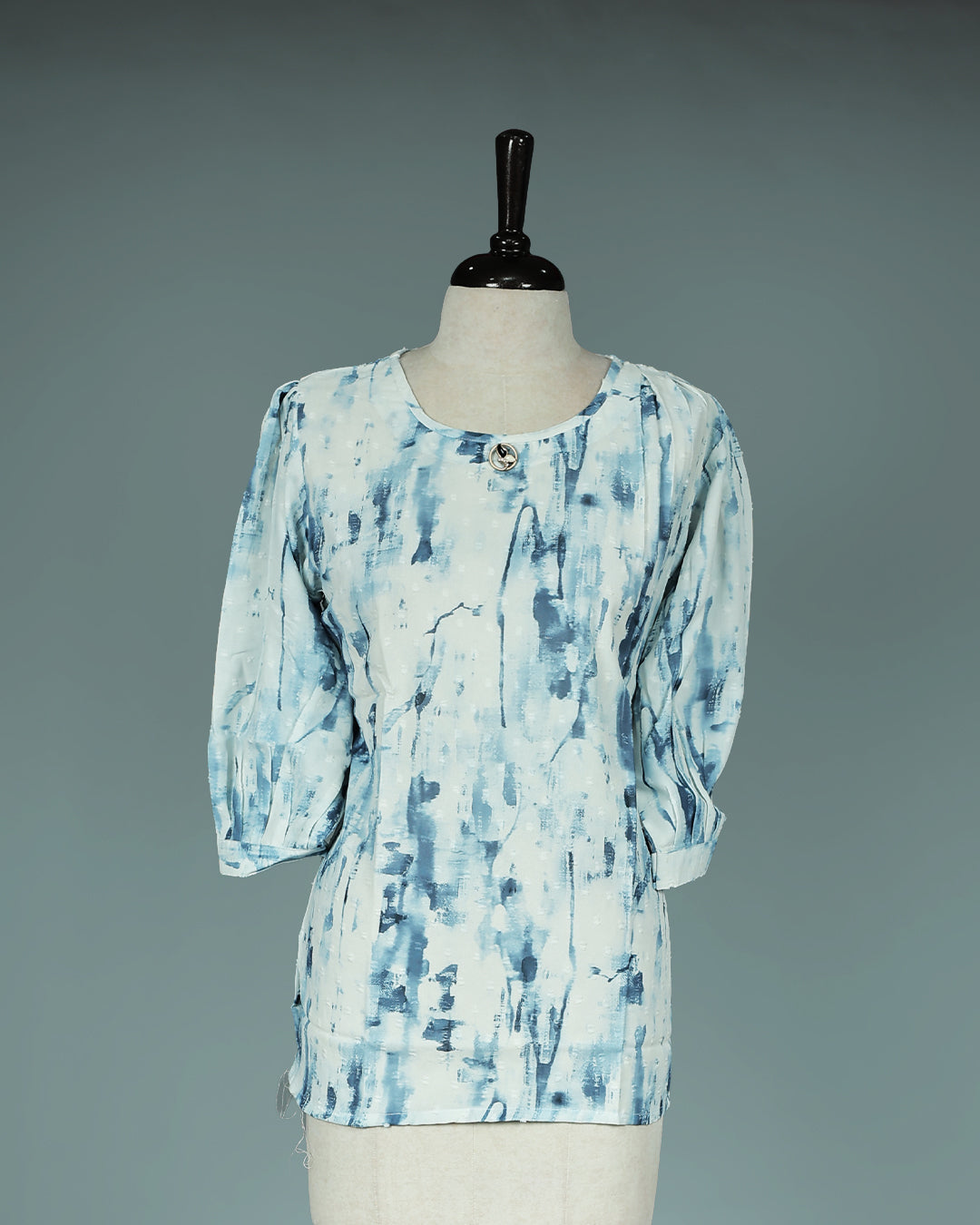 Blue colour Top with Print on body, Round neck design, With sleeve.