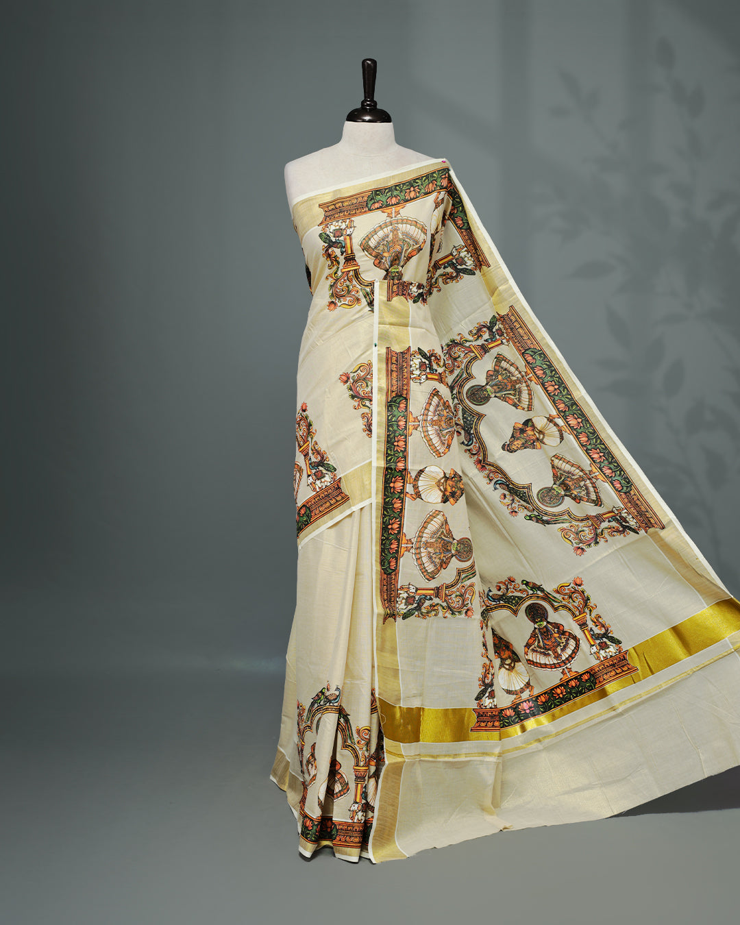 Cream colour Tissue Kerala saree Featuring An Elegant body, complemented by a classic gold zari with Indian Art form print on border, matching blouse piece.