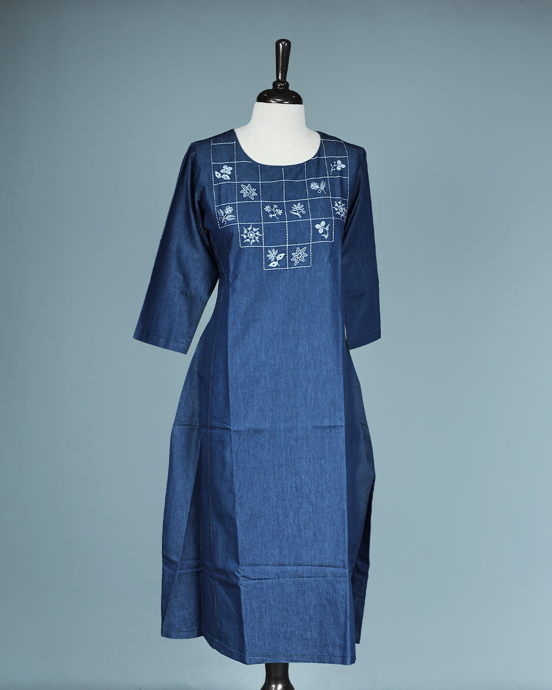 Blue Denim Design Colour Kurti featuring Thread Box with Floral motifs Work On body , a U neckline, With sleeve.